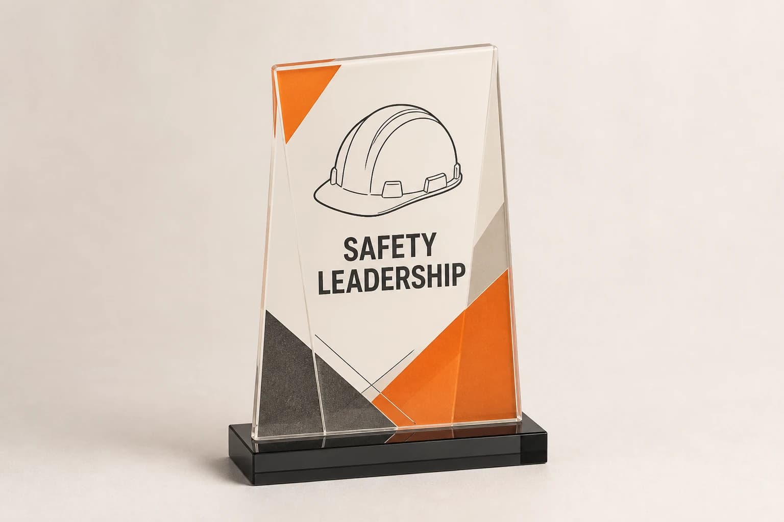 Orange and charcoal printed acrylic safety-leadership award.