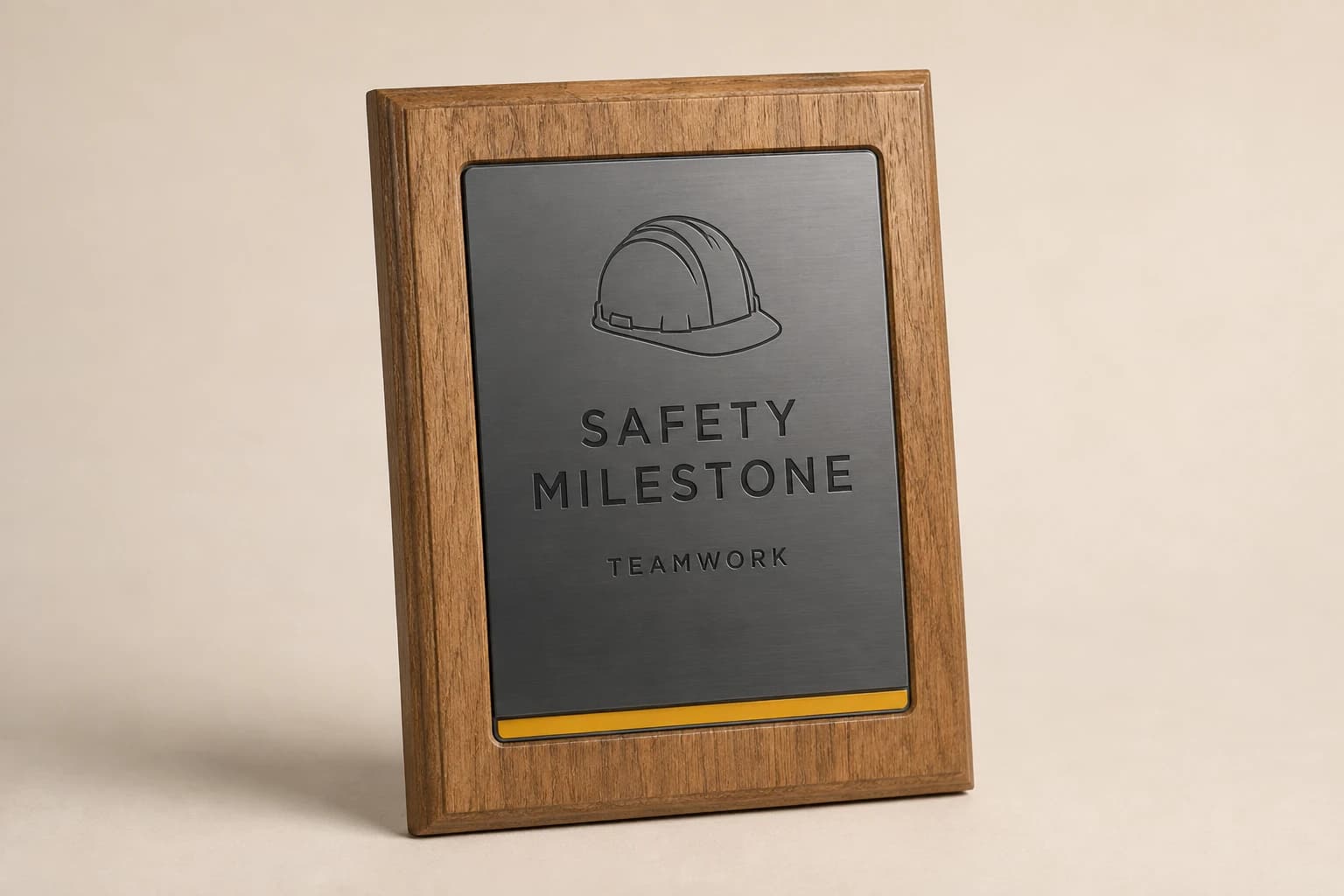 Oak safety milestone plaque with graphite plate and yellow accent.